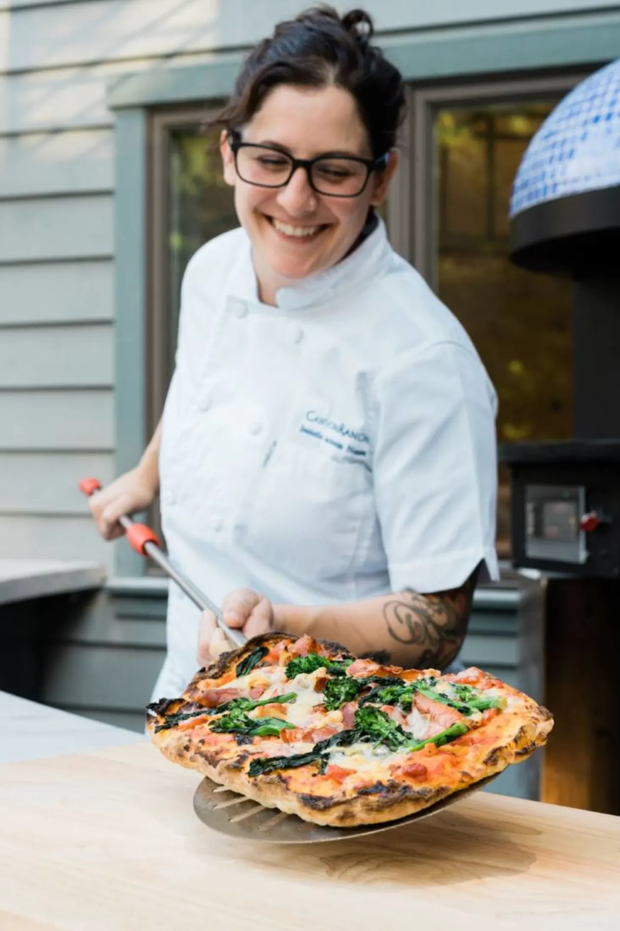Canyon Ranch Woodside chef serving pizza